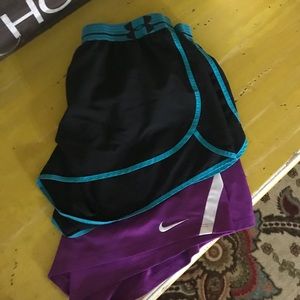 2 pairs of running shorts Under Armor and Nike
